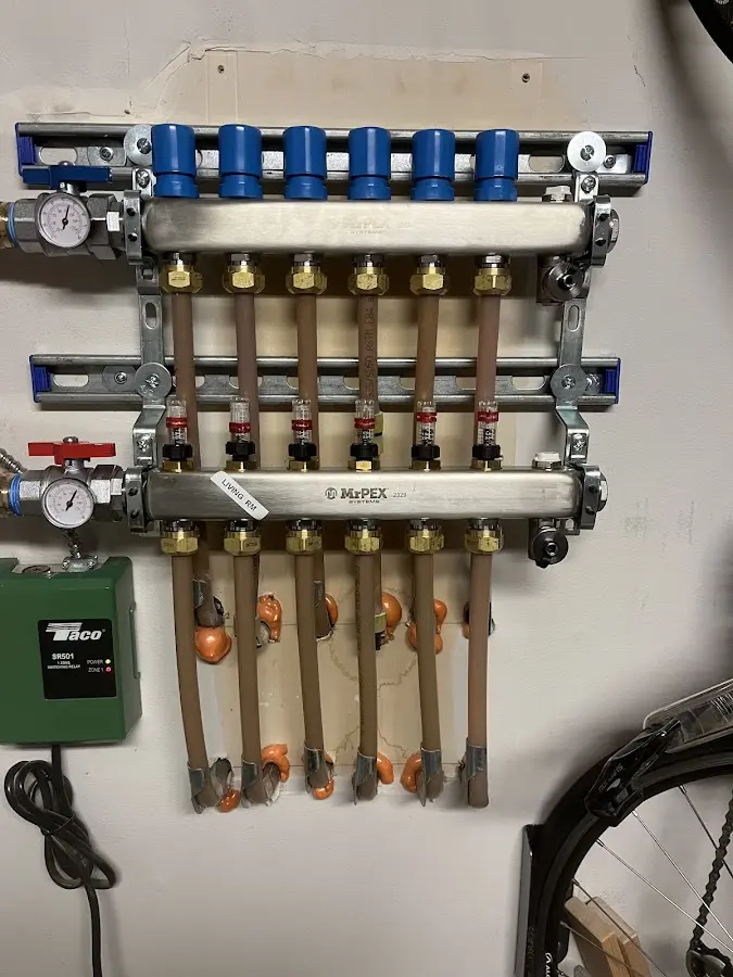 Plumber performing Gas Leak Detection at a residential property in Montevideo